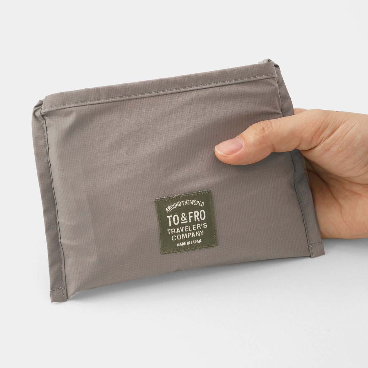 TRAVELER'S COMPANY Traveler's Factory x TO&FRO Rain Bag - Warm Gray -